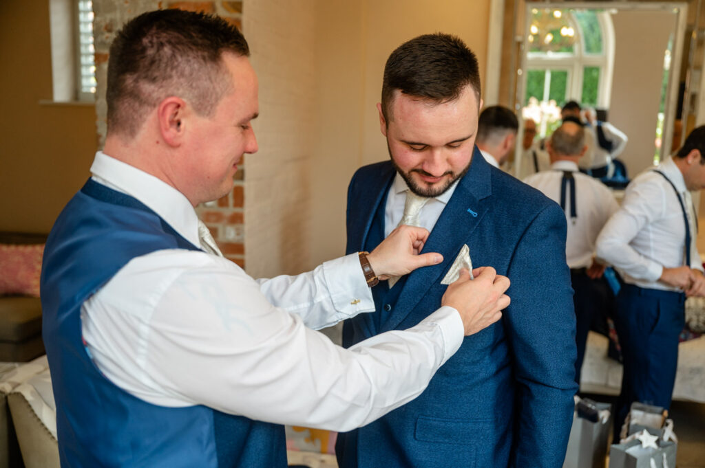 Groom getting ready with groomsmen