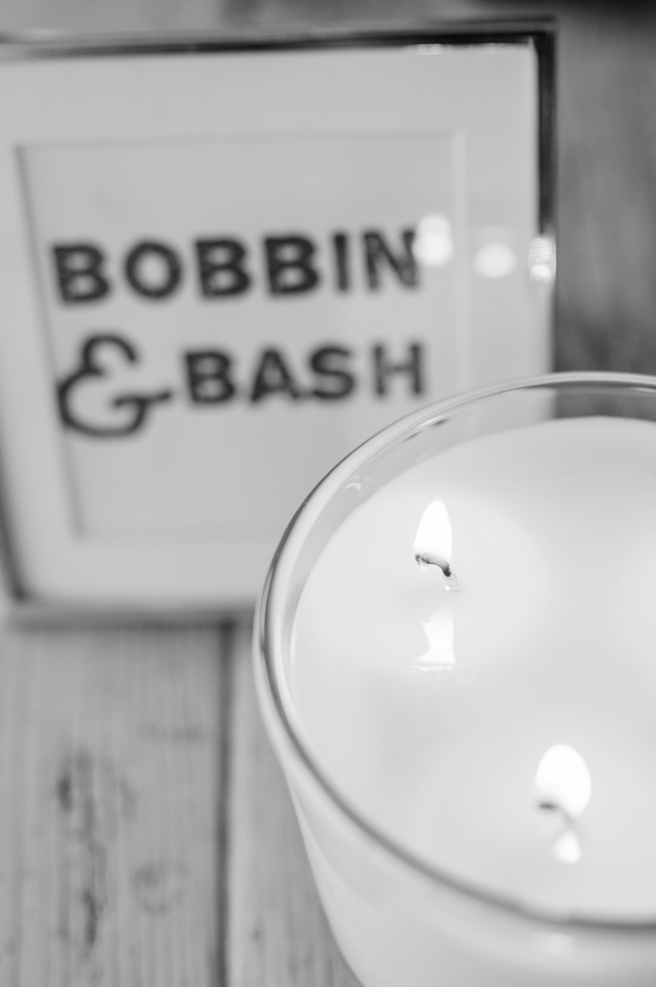 candle detail and business logo