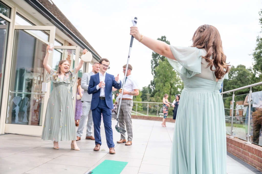 wedding guests enjoying golf