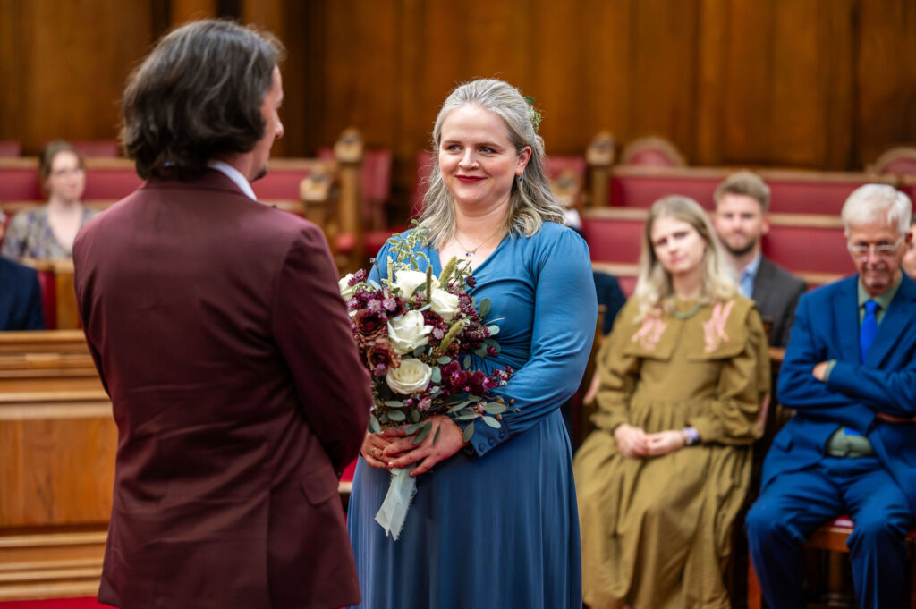 Wedding ceremony in the Council Chamber at Islington Town Hall with intimate guest group