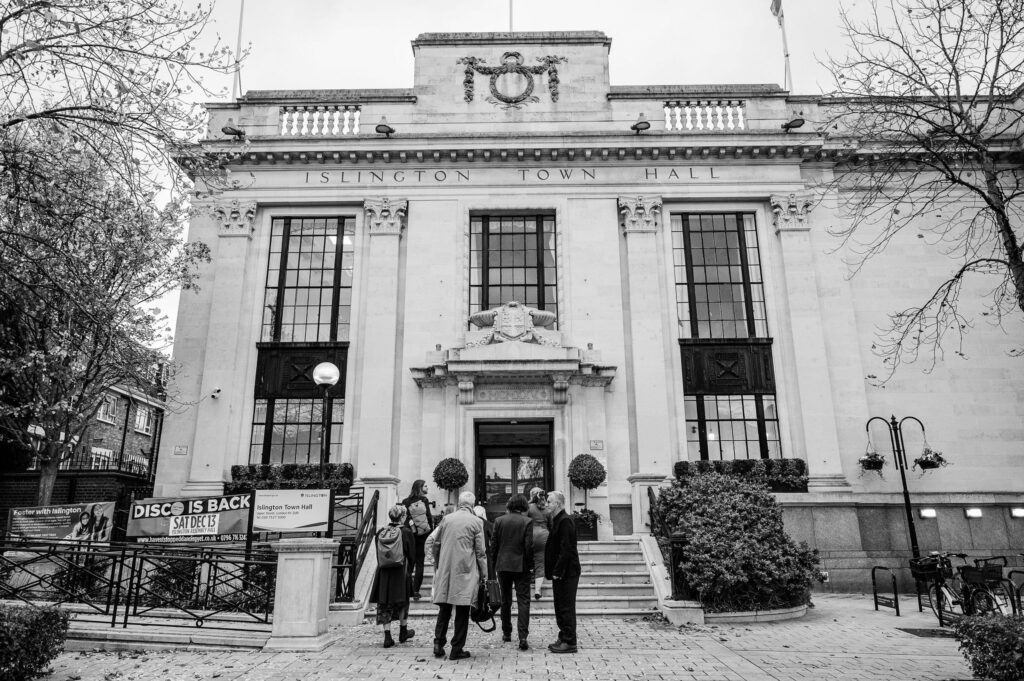 Guests arriving at Islington Town Hall for a London micro wedding