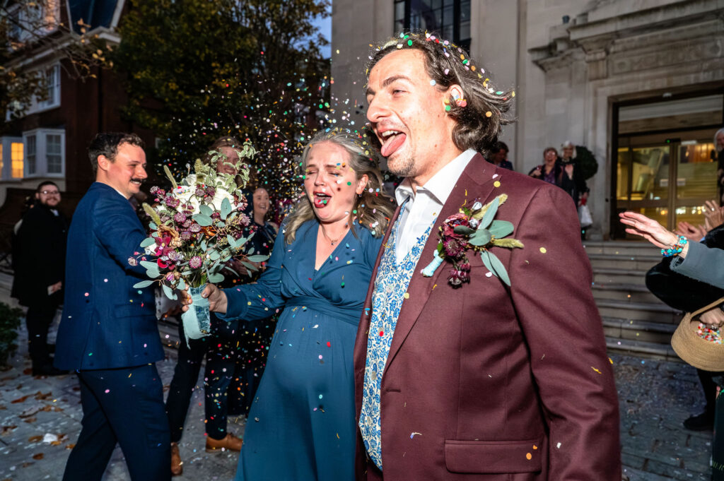 Candid laughter and confetti chaos outside Islington Town Hall