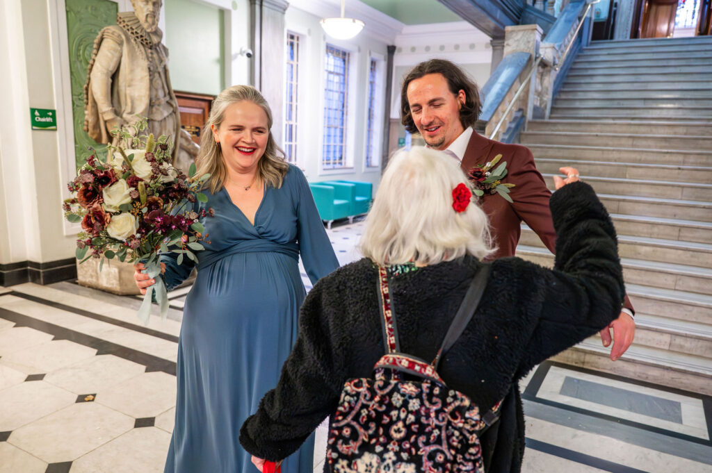 Guests arriving at Islington Town Hall for a London micro wedding