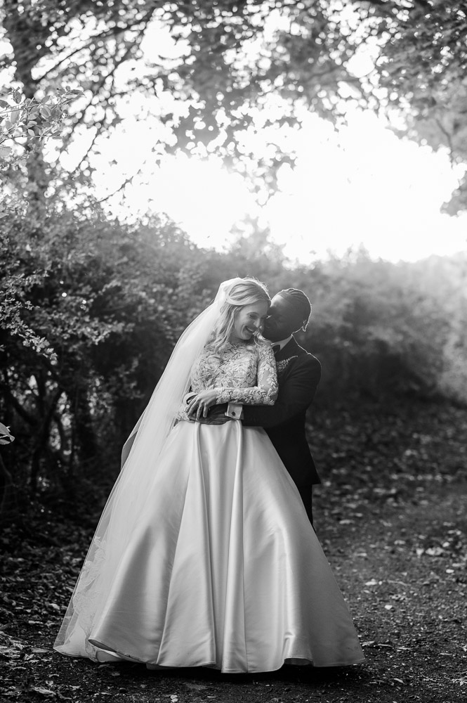 A black and white portrait of the bride and groom at a Chenies Manor wedding