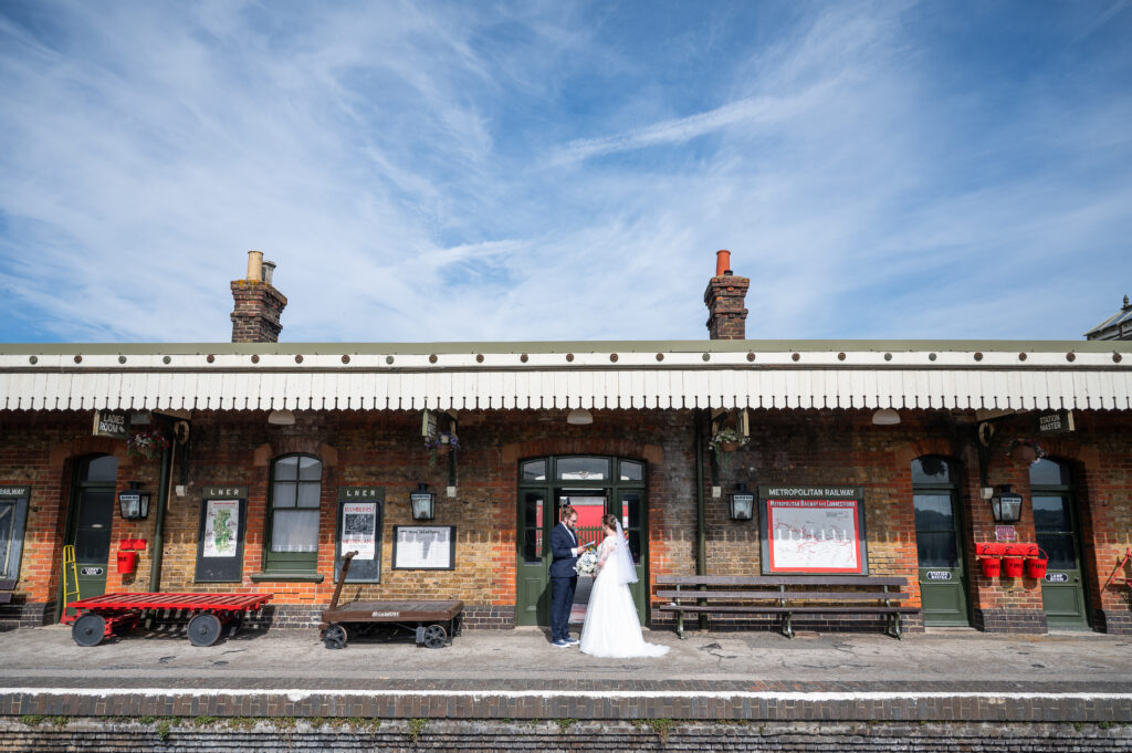 A private vow reading between a bride and groom before the ceremony at Bucks Railway Centre